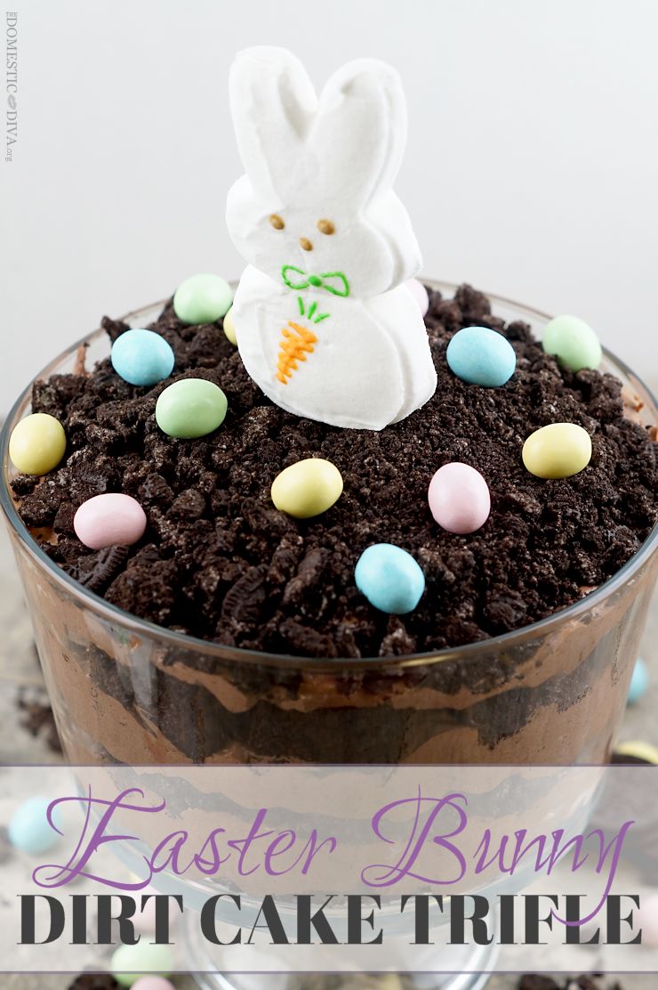 Easter Bunny Dirt Cake Trifle Recipe: Rich chocolatey cake trifle with decadent layers of chocolate pudding and crushed oreos. Top this trifle with Easter themed edible decorations like a marshmallow bunny and milk chocolate candy coated eggs and you have a dessert everyone will be talking about.